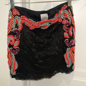 Never worn PatBo black lace mini skirt with beading